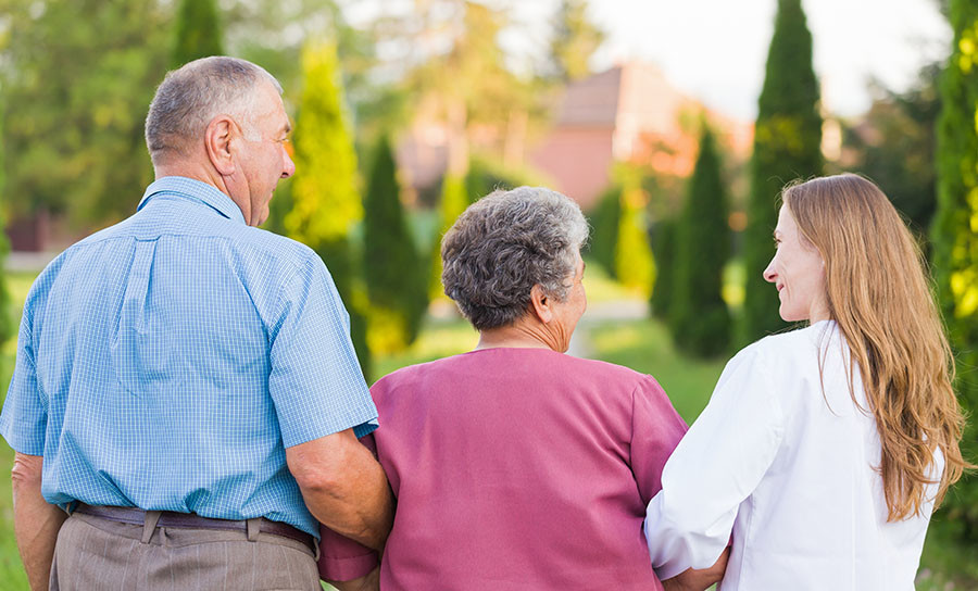 older couple with carer