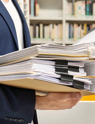 man inspecting documents