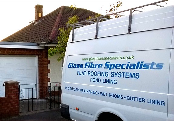 Flat roof in Caldicot with van.