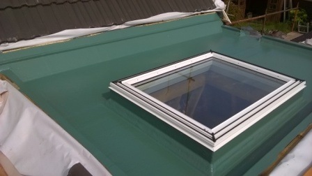 Green glass fibre roof with window.