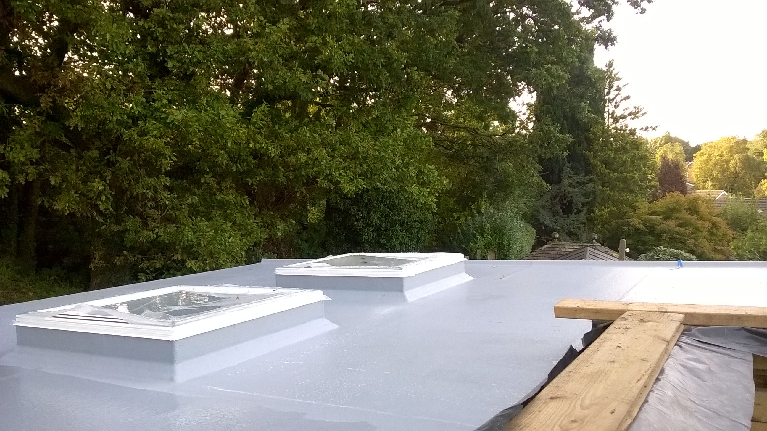 Fitting skylights into a GRP flat roof