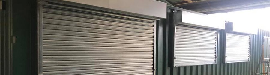 view of roller shutter doors and windows