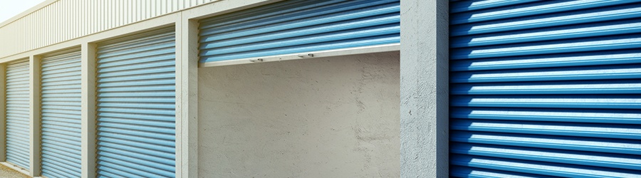 a row of roller shutter garage doors