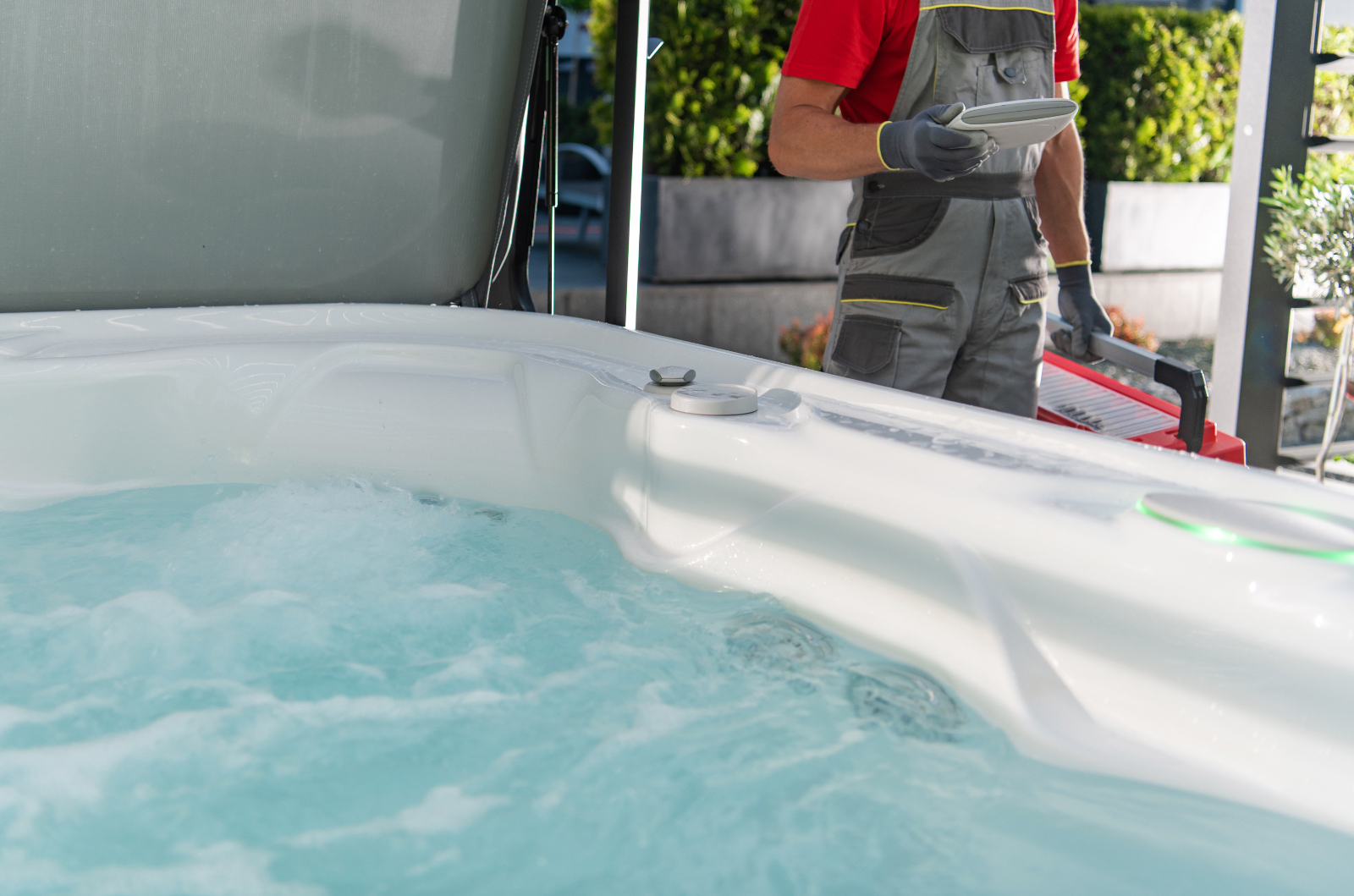 Plumber next to hot tub