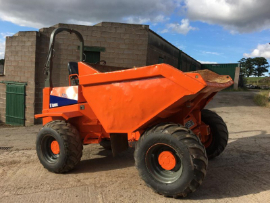 Image of an orange dumper