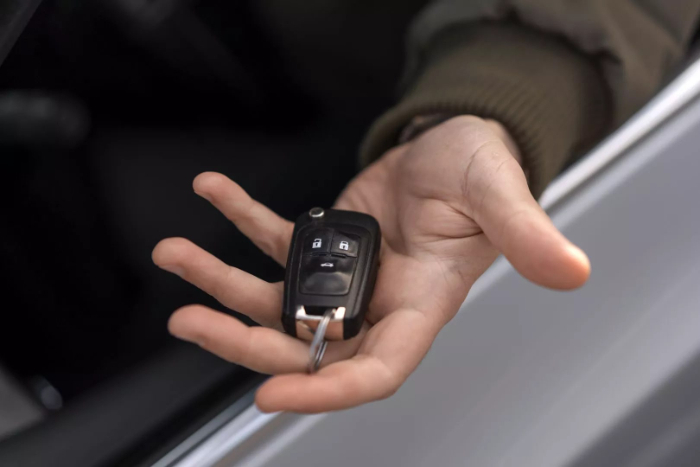 Handing a Car Key - How do I get into my car if I'm locked out