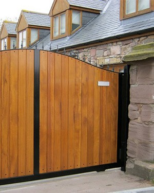 wooden and iron driveway gate