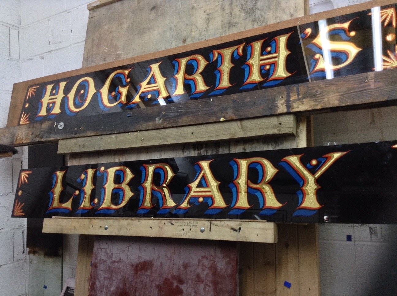 gold gilded pub signs
