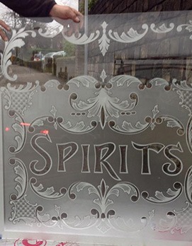 acid etched glass window for public house