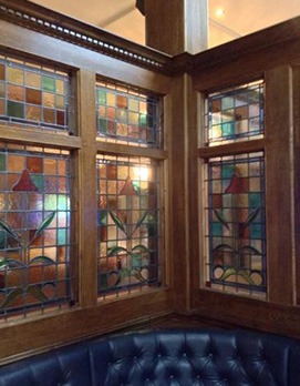 stained glass windows inside a pub
