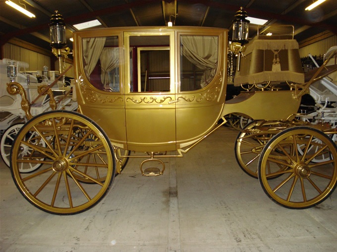 Golden Cinderella horse and carriage