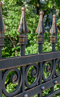close up detail of wrought iron gate