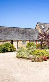 exterior of a converted Cotswolds barn