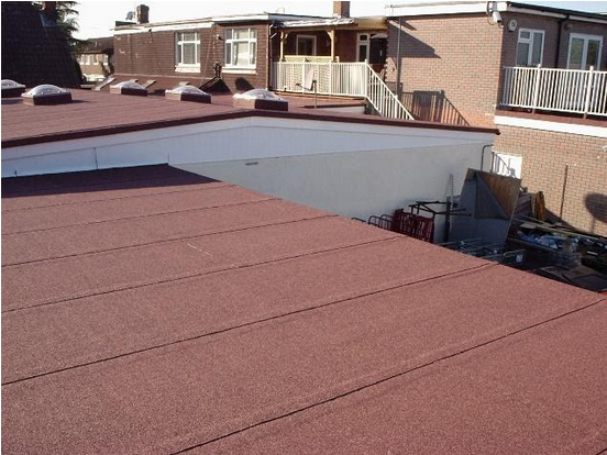 Red felt flat roof on a commercial building