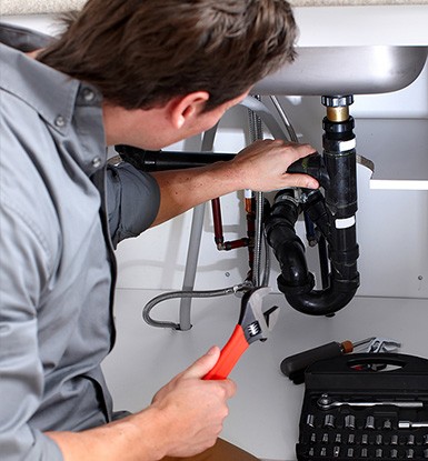 engineer repairing pipes