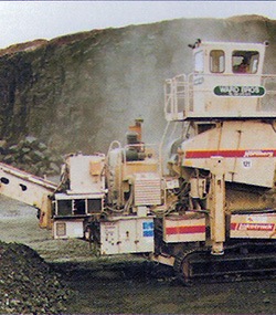 concrete crusher working on site