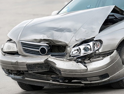 silver car in car accident