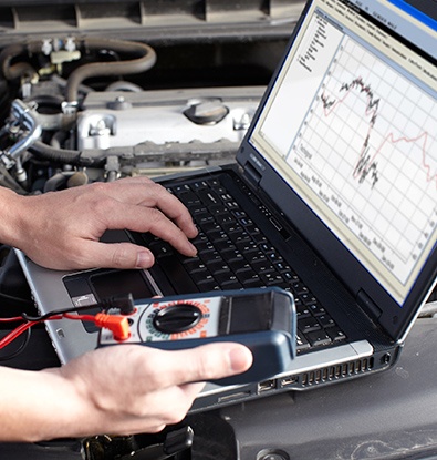 inspecting the performance of a car engine