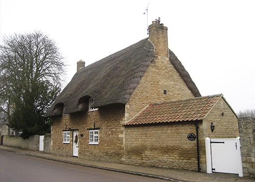 Restoration Of Heritage Buildings in Staffordshire - historic cottage by the road